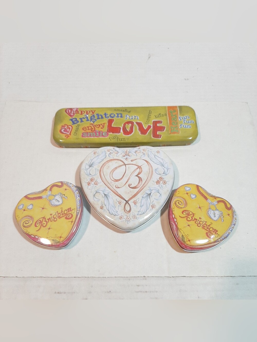 Collection of 4 retired Brighton collectible empty metal keepsake tins